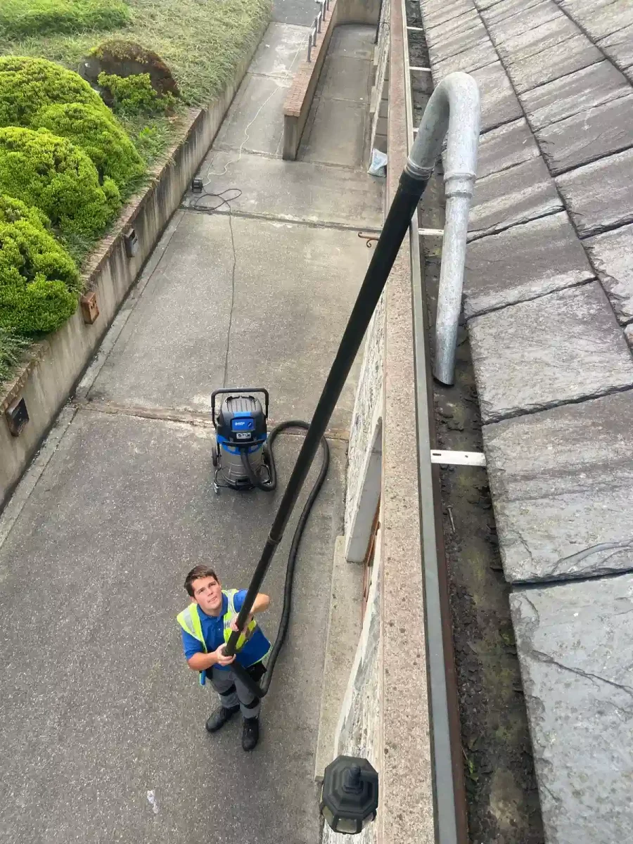 prokleen-staff-cleaning-the-gutter Prokleen Staff Cleaning the Gutter of a building in Letterkenny, Donegal